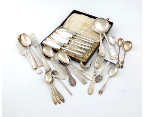 A mixed lot of Danish silver flatware, comprising: a pair of sugar tongs, two fork and spoon sets, two serving spoons, a pair