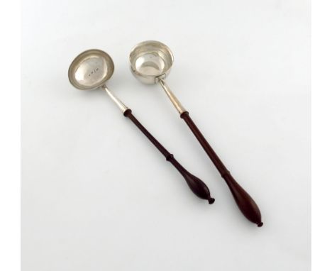 A George I silver punch ladle, maker's mark worn, London 1722, circular bowl, turned wooden baluster handle, scratch initiall