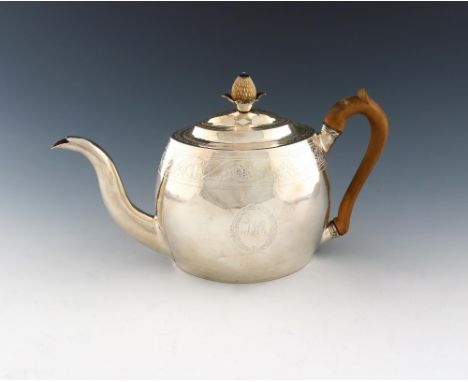 λ A George III silver teapot, by Alexander Field, London 1800, oval form, scroll handle, bright-cut decoration, domed flush h