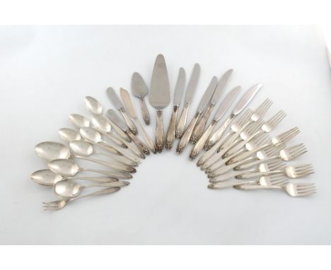 A collection of American silver flatware, marked International Sterling, Prelude, the terminals with a foliate motif, compris