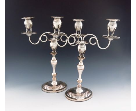 A pair of George III old Sheffield plated two-light beehive candelabra, probably by Roberts Cadman and Co, circa 1795, balust