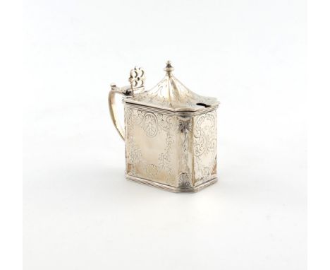 A George II silver mustard pot, by John Delemster, London 1759, rectangular form, incurved corers, engraved foliate decoratio