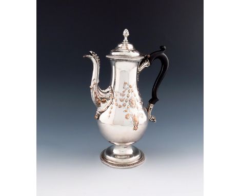 A George III old Sheffield plated coffee pot, circa 1775, baluster form, ribbon-tied foliate decoration, beaded borders, shel
