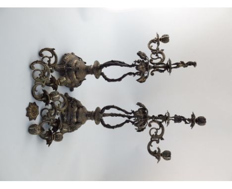 A pair of 19th century German / Austro-Hungarian silver four-light candelabra, maker's mark of C.B, the columns with three si