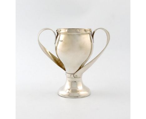 An Edwardian silver Art Nouveau two-handled cup, by Samuel Jacob, London 1910, baluster form, scroll handles, punch bead bord
