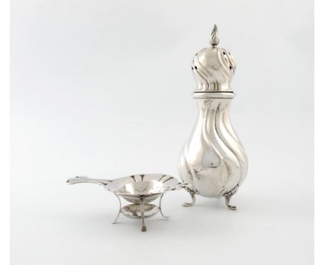 A Danish silver sugar caster, Copenhagen 1910, swirl baluster form, the pierced cover with a flame finial, on three scroll le
