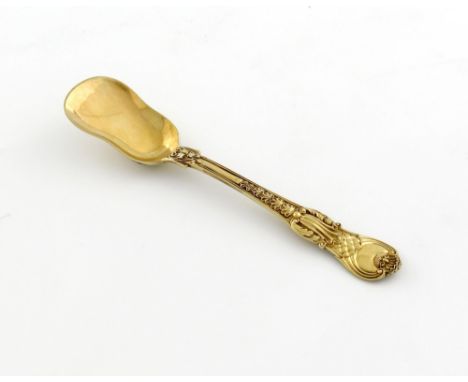 A George III silver-gilt Coburg pattern ice cream spade, by Paul Storr, London 1818, the reverse of the terminal with a conti