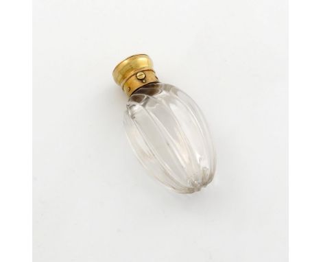 A 19th century silver-gilt mounted scent bottle, the cover with a push-button clasp and engraved with initials and dated 1854