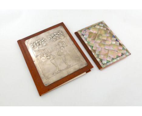 An Art Nouveau silver-mounted leather blotter, unmarked, rectangular form, with two trees and embossed 'BLOTTER', length 29.5