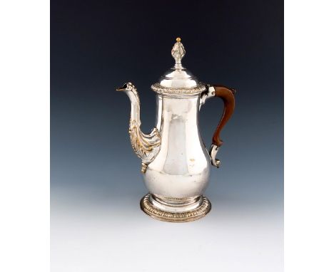 A George III old Sheffield plated coffee pot, by Henry Tudor and Co, circa 1765, baluster form, shell and bead mounted spout,