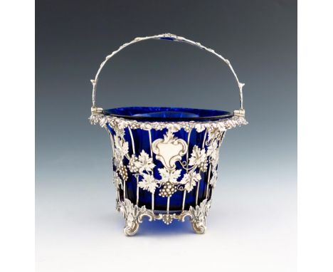 A Victorian silver swing-handled sugar basket, by The Barnards, London 1846, circular tapering form, wirework body applied wi