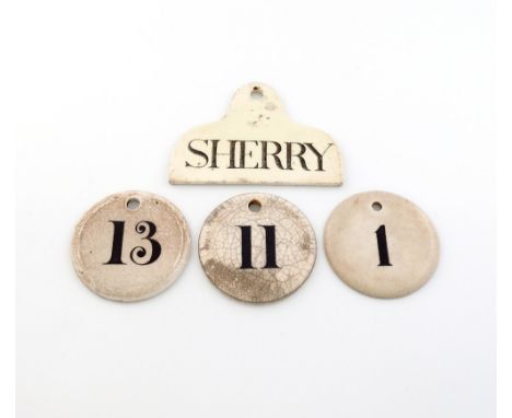 A small collection of four 19th century ceramic bin labels, comprising: one of arched rectangular form, titled 'SHERRY', leng