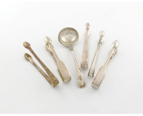 A mixed lot of silver flatware, various dates and makers, comprising: two pairs of Newcastle sugar tongs, three further pairs