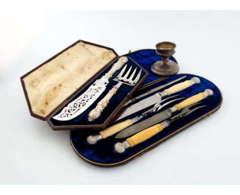 λ A mixed lot, comprising: a cased five-piece Victorian silver mounted carving set, Sheffield 1890, ivory handles, fluted mou