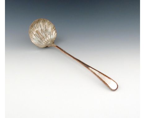 A George III old Sheffield plated Feather-edge pattern soup ladle, unmarked, circa 1770, shell shaped bowl, with a shell heel