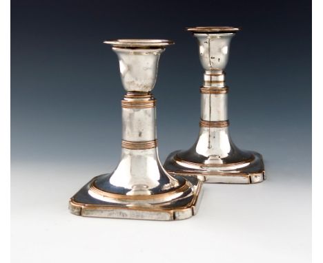 A pair of George III Eckhardt's patent old Sheffield plated telescopic candlesticks, circa 1795, plain telescopic columns, re