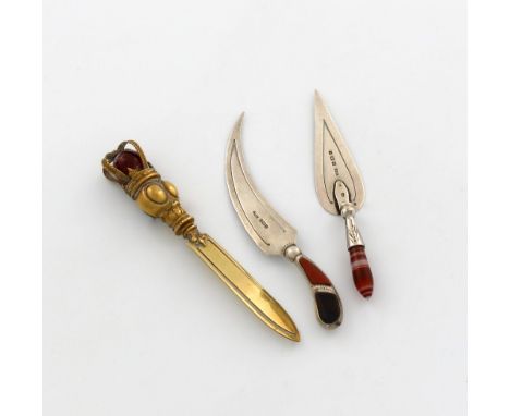 A small mixed lot of three page markers, comprising a silver one of dagger form, the handle set with hard stones, by Lovekin 