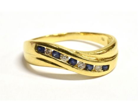 18CT DIAMOND &amp; SAPPHIRE ETERNITY RING  A channel set head with alternating round mid blue sapphires, estimated 0.15 carat