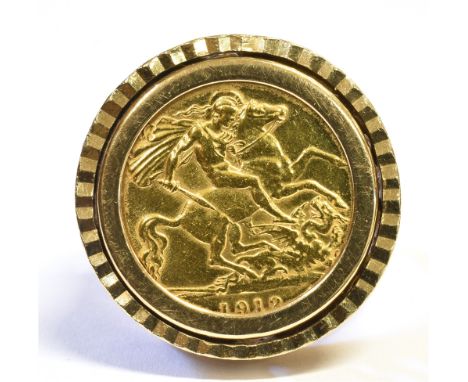 HALF SOVEREIGN RING    Dated 1912, spectacle set in 9ct gold, with bright cut frame and filigree rope work and mustang motif 