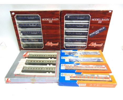 [HO GAUGE]. ASSORTED EUROPEAN OUTLINE ROLLING STOCK  by Liliput, Roco and Lima, including coach packs, each boxed, (7).