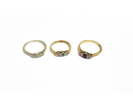 9CT GEM &amp; DIAMOND SET THREE STONE RINGS  One claw set with three round brilliant cut diamonds, estimated to total 0.33 ca