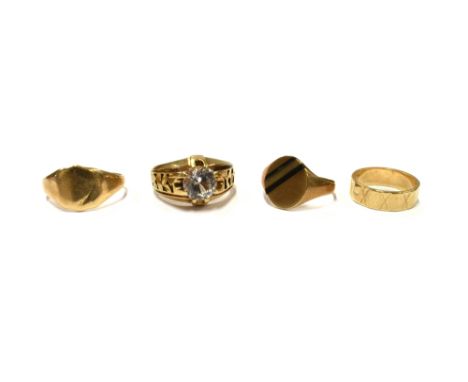 VARIOUS 9CT GOLD RINGS  To include one set with a brilliant cut white sapphire, one plain signet ring, a signet ring inset wi