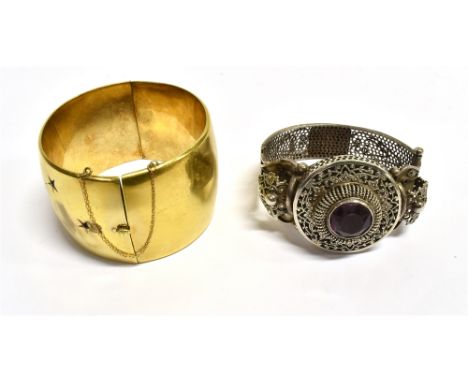 VINTAGE GOLD PLATED &amp; SILVER BANGLES  To include a 'Wonder Woman' style, 4cm wide cuff bangle, star grain set with red, g