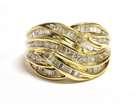 9CT GOLD &amp; DIAMOND DRESS RING  An interlocking ribbon style head, channel set with round brilliant cut, princess cut and 