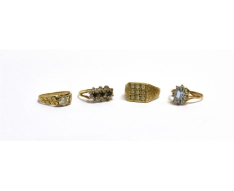 9CT GOLD GEM &amp; CZ SET RINGS  To include a dark sapphire and CZ floral cluster, an oval blue topaz and CZ halo ring, a squ