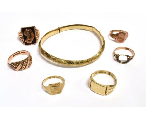 VARIOUS ITEMS OF 9CT GOLD JEWELLERY  To include a bright cut engraved bangle (slightly bent), rose and yellow gold signet rin