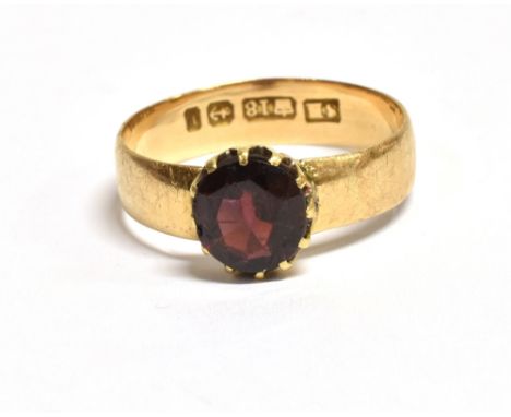 VICTORIAN 18CT GOLD &amp; GARNET RING  Coronet claw set almandine garnet on a 4.7mm wide band, ring size Q.  Hallmarked 18 Bi