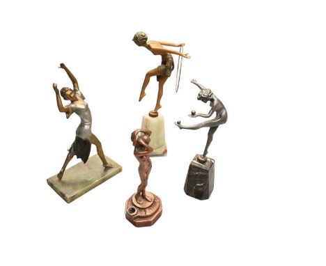 Group of four Art Deco style figures of females.