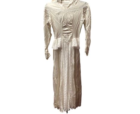 Three vintage wedding dresses, including 1950s satin and lace, 1980s Oyster satin, pointed waistline and rosettes on dropped 