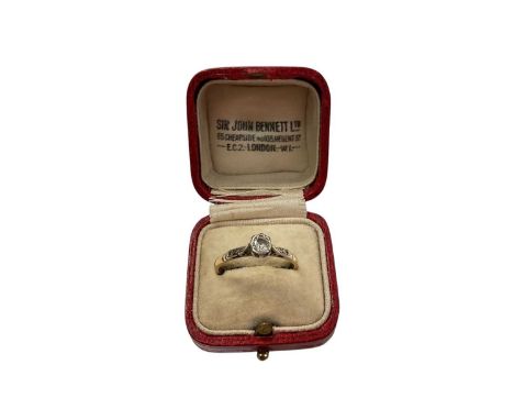 Antique diamond single stone ring with a brilliant cut estimated to weigh approximately 0.20cts on platinum setting on 18ct g