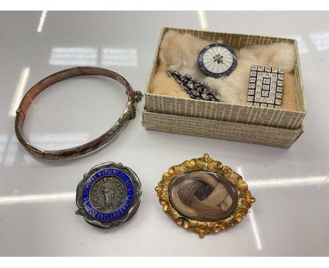 9ct gold bangle, Victorian gilt metal glazed hairwork mourning brooch, silver and enamel brooch, silver nursing pin and a pas