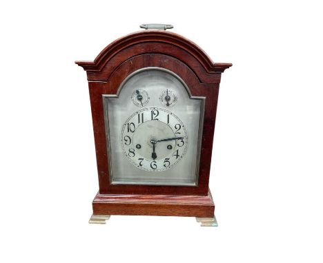 1920s timing bracket clock with silvered arched dial in mahogany case, approximately 40cm in height