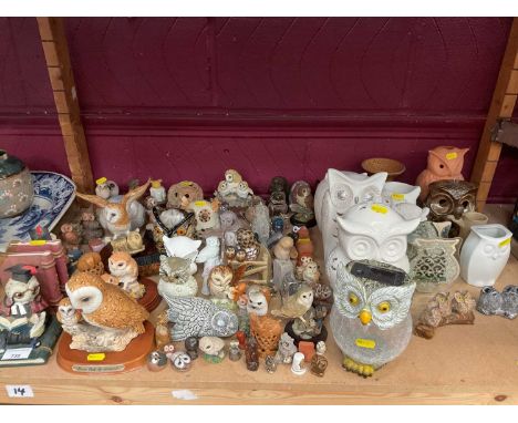 Collection of ceramic and glass owl ornaments 