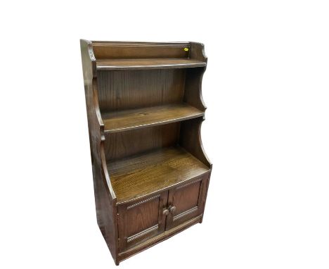 Ercol waterfall bookcase, 61cm wide, 34cm deep, 110.5cm high 