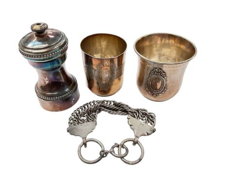 Two French white metal beakers, pepper grinder and a white metal bracelet 