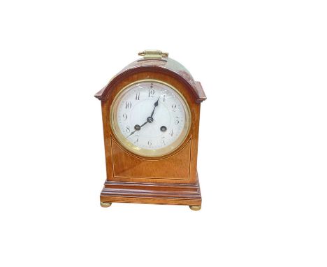 Edwardian mahogany mantle clockThe clock appears to be fully wound and not in running condition.