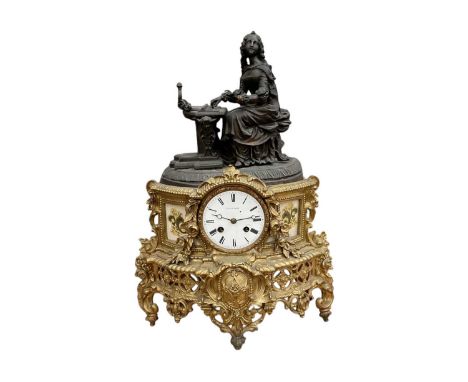 Late 19th century French gilt and bronzed spelter mantle clock by Poton, Paris with female figure pianist surmount.