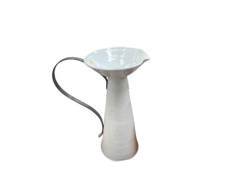 Very large white ceramic jug with metal handle 
