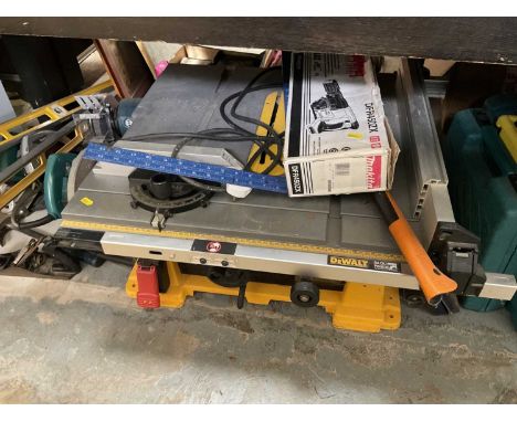Large collection of tools including folding workbench, Makita and DeWalt tools and others