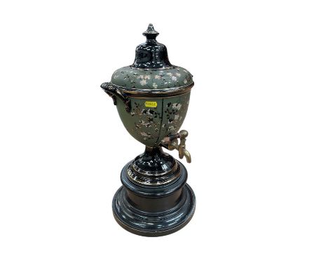 Victorian ceramic water dispenser on a turned wood base.