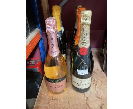 Bottle of Moët and Chandon imperial Champagne and 5 other bottles of Prosecco