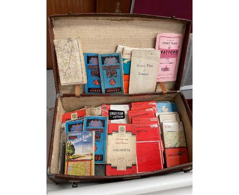 Vintage suitcase containing ordnance survey maps, road maps and various other unframed maps