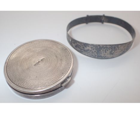 Sterling silver childs bangle and a hallmarked silver small compact 