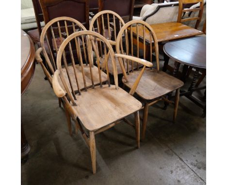 A set of four Ercol elm and beech Windsor chairs 