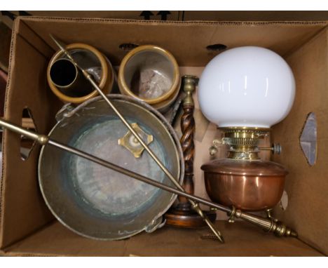 A large brass jam pan, copper and brass oil lamp, two stoneware pots, an oak barleytwist candlestick, etc.