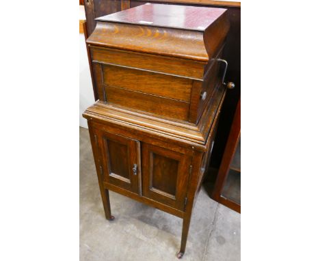 A Columbia oak gramophone on stand, with original manual, etc. 